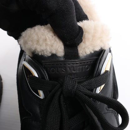 Baskets Louis Vuitton Runaway 22 ans en cuir et daim noir et marron, taille 38 EU.
