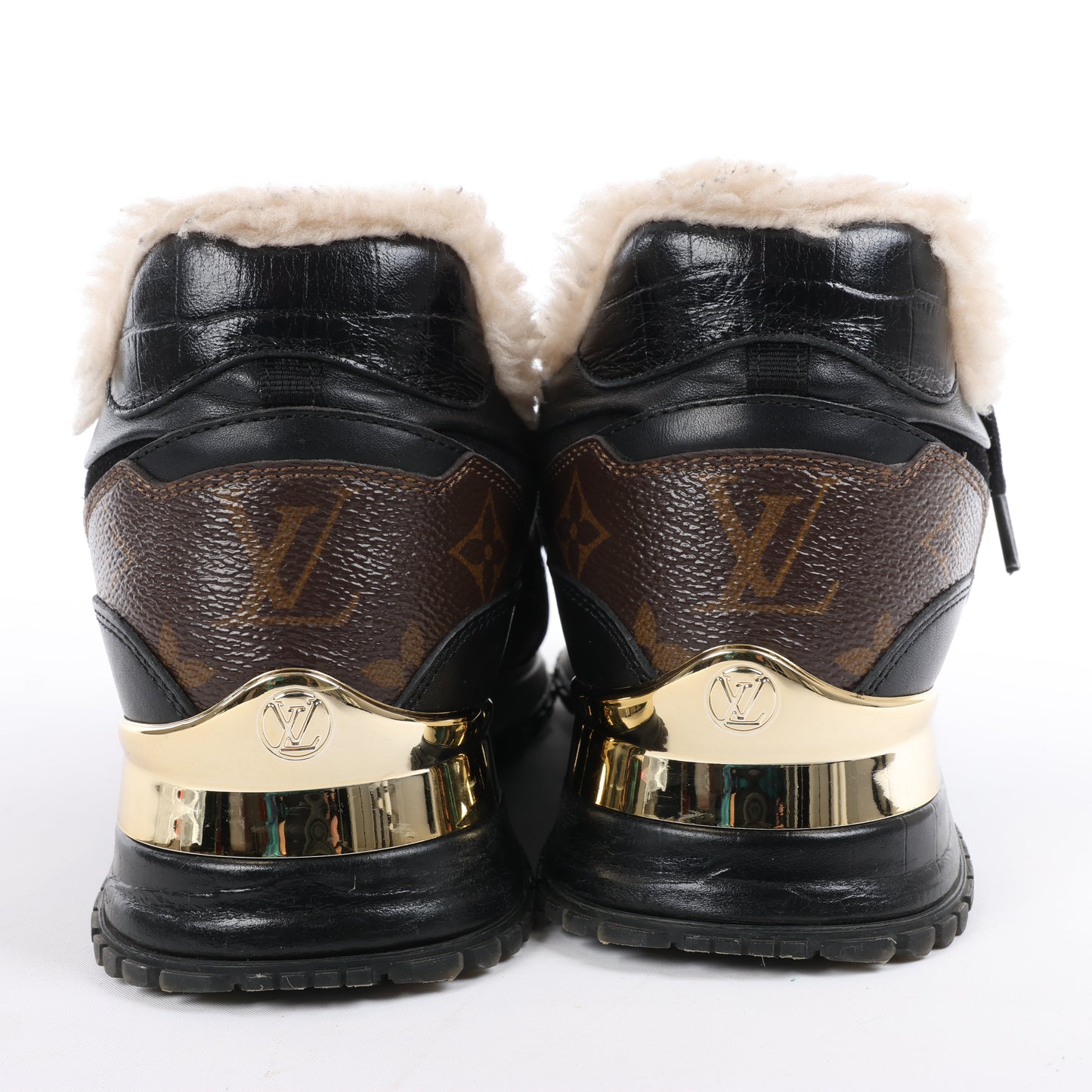Baskets Louis Vuitton Runaway 22 ans en cuir et daim noir et marron, taille 38 EU.