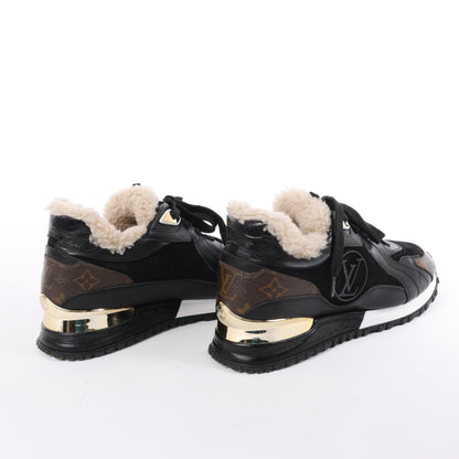 Baskets Louis Vuitton Runaway 22 ans en cuir et daim noir et marron, taille 38 EU.