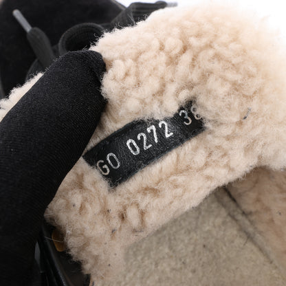 Baskets Louis Vuitton Runaway 22 ans en cuir et daim noir et marron, taille 38 EU.