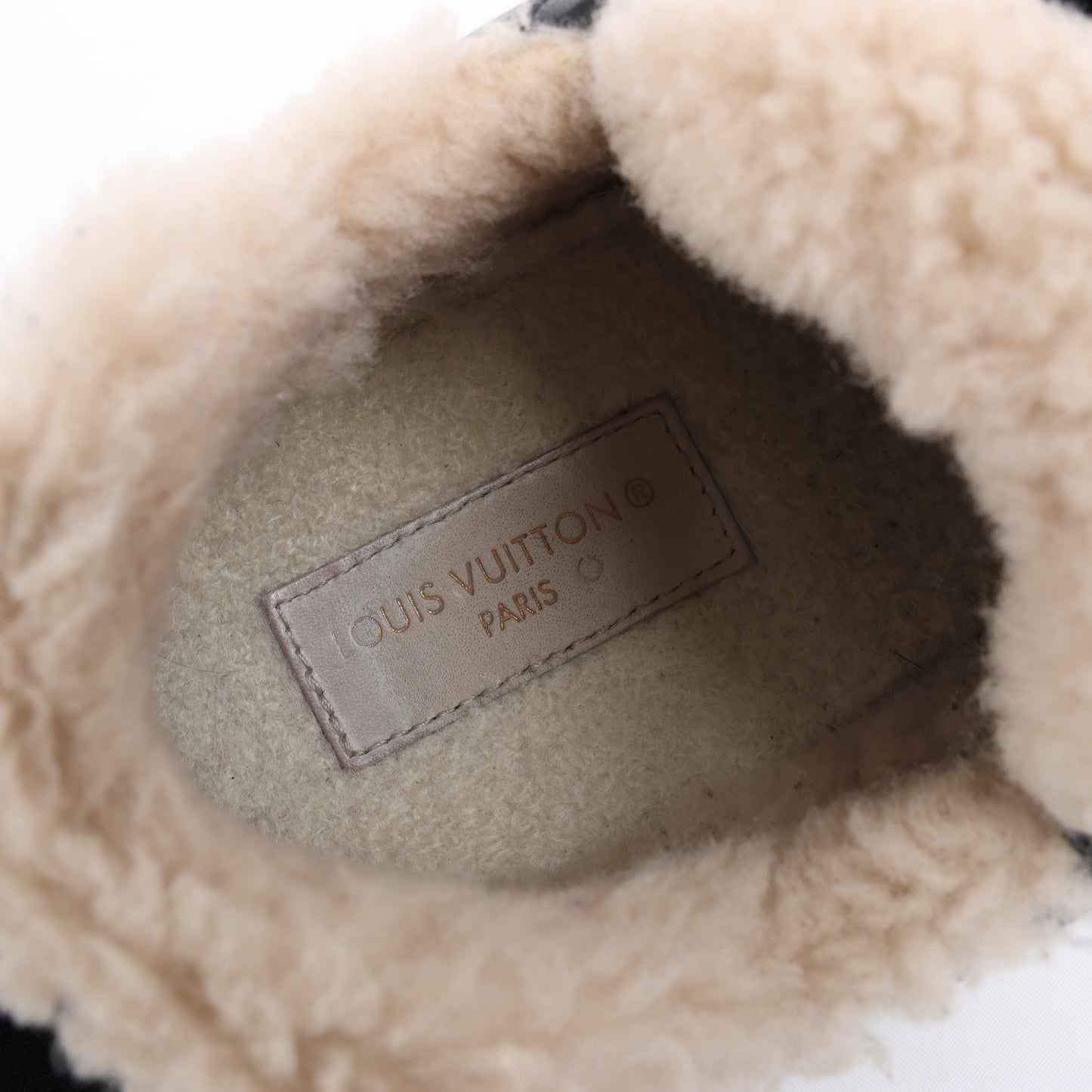 Baskets Louis Vuitton Runaway 22 ans en cuir et daim noir et marron, taille 38 EU.