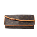Front view of Louis Vuitton Monogram Canvas Pochette Twin GM Shoulder Bag M51852 with brown monogram pattern, natural leather trim, and thin adjustable strap, displayed against a white background.