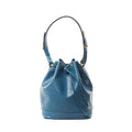Blue Louis Vuitton Noé bucket bag in Epi leather with drawstring top, gold-tone grommets, and adjustable shoulder strap on a white background.