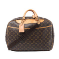 Front view of a brown Louis Vuitton Alize 2 Poches Monogram canvas travel bag with tan leather handles, trim, luggage tag and dark brown shoulder strap.