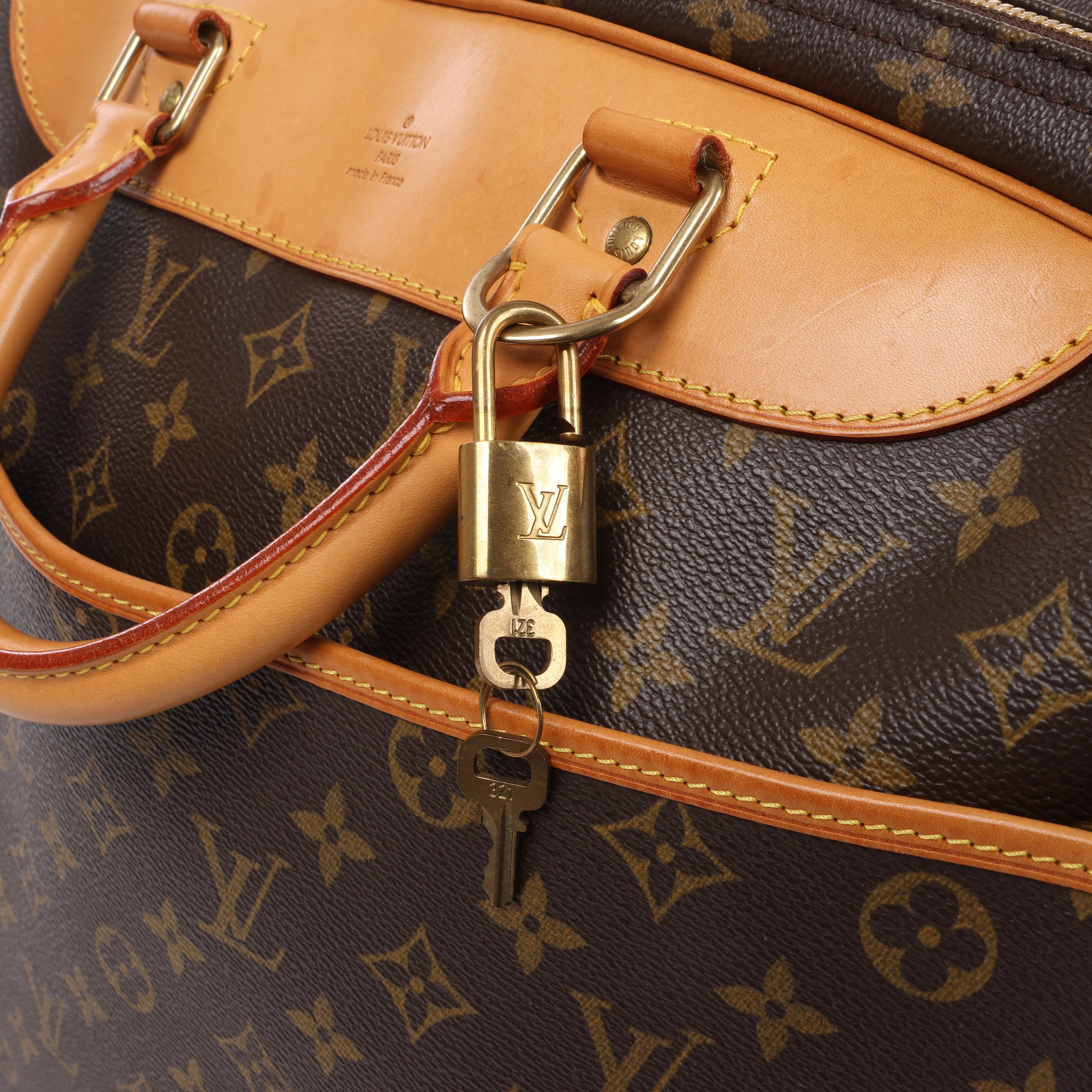 Bolso de viaje Louis Vuitton Alize Monogram Canvas con dos bolsillos en marrón M41399