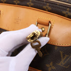 Bolso de viaje Louis Vuitton Alize Monogram Canvas con dos bolsillos en marrón M41399