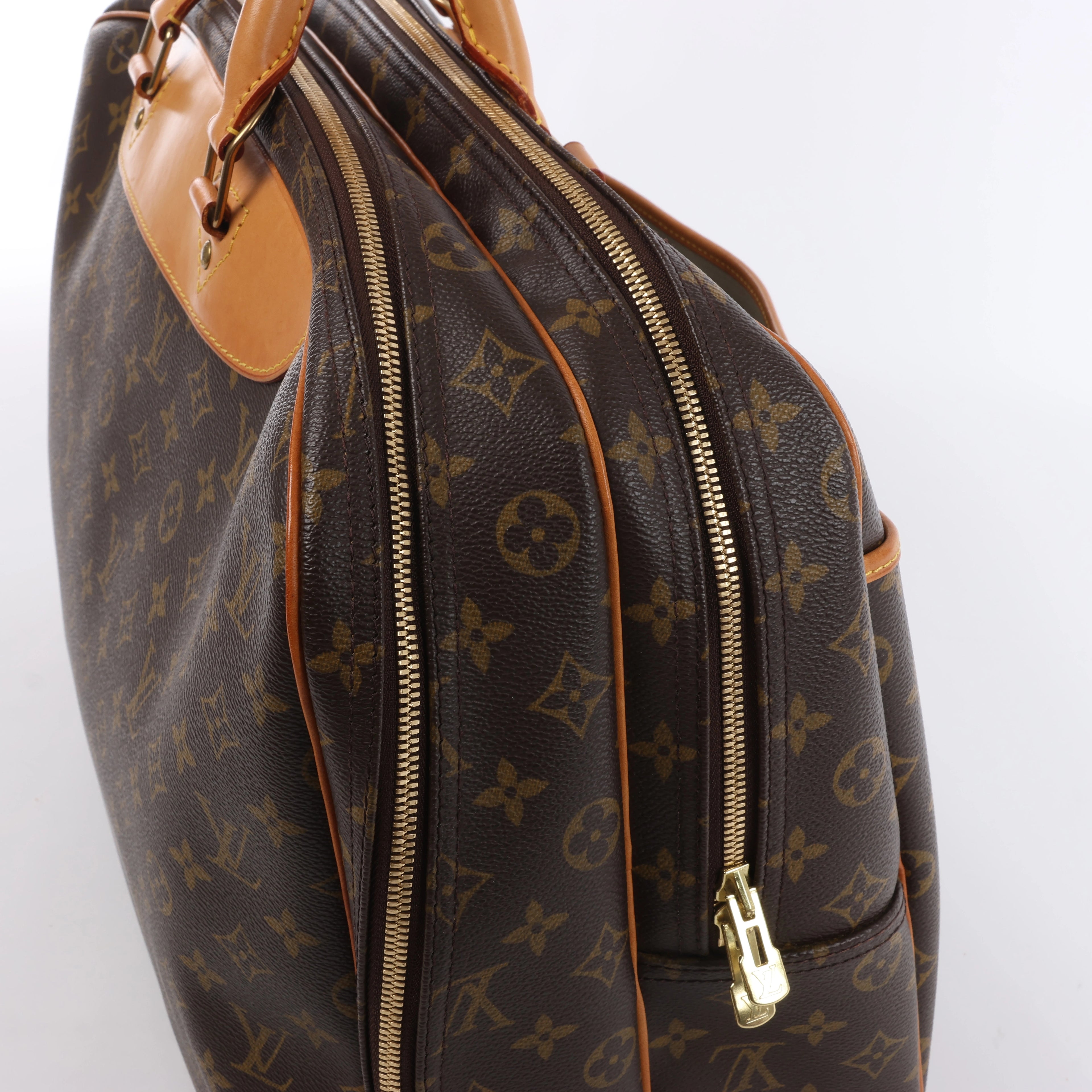 Bolso de viaje Louis Vuitton Alize Monogram Canvas con dos bolsillos en marrón M41399