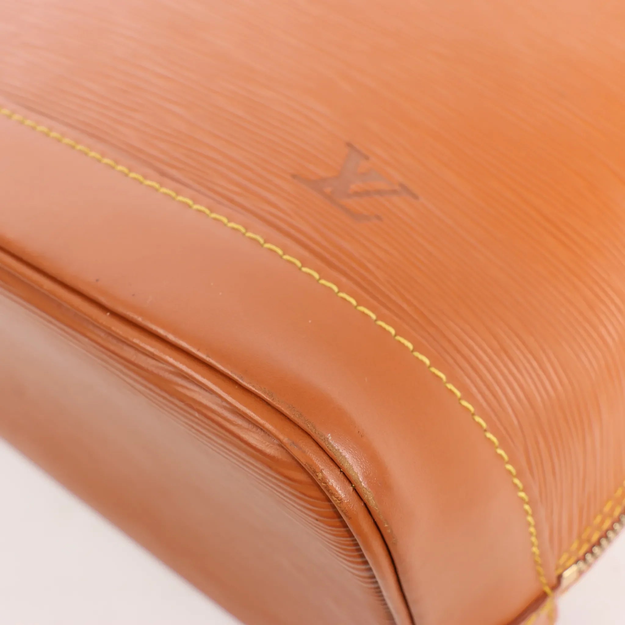 Louis Vuitton Alma PM Epi Leather Handbag in Brown
