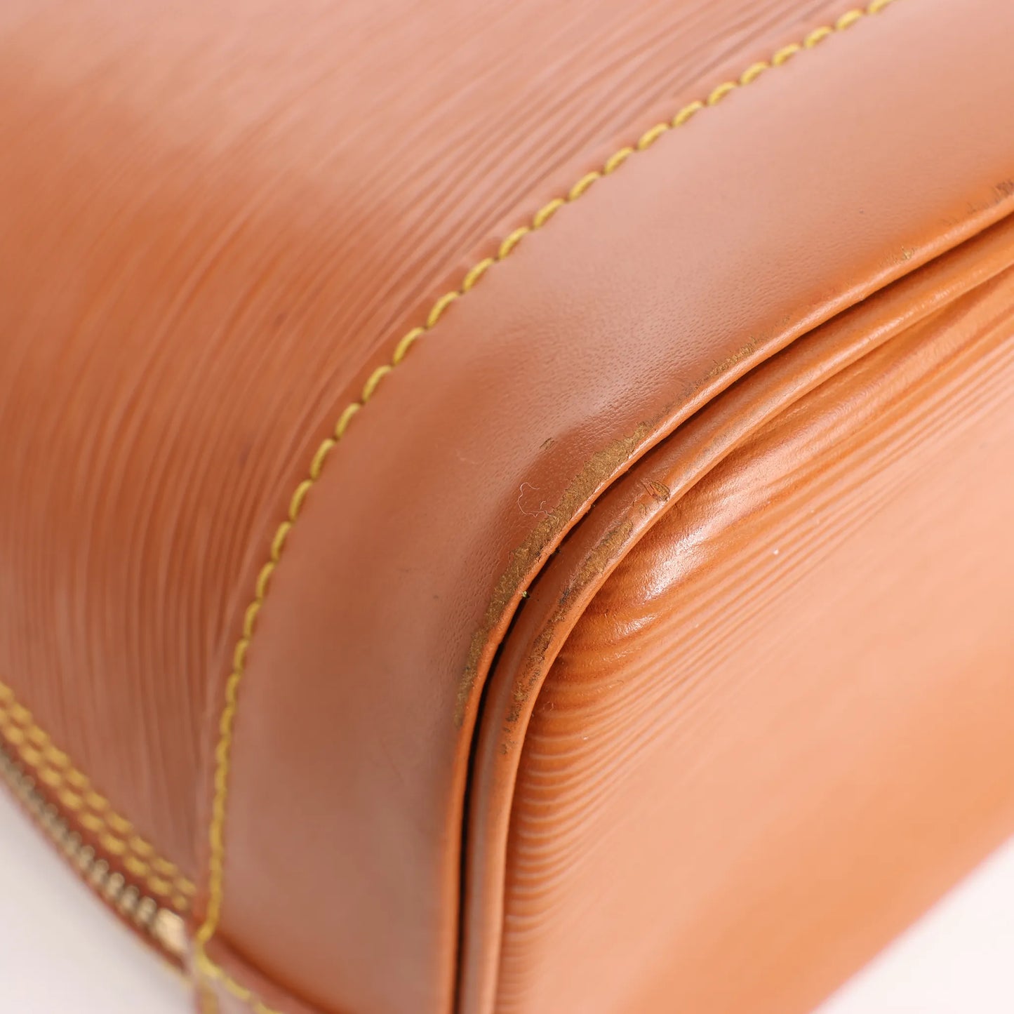 Louis Vuitton Alma PM Epi Leather Handbag in Brown