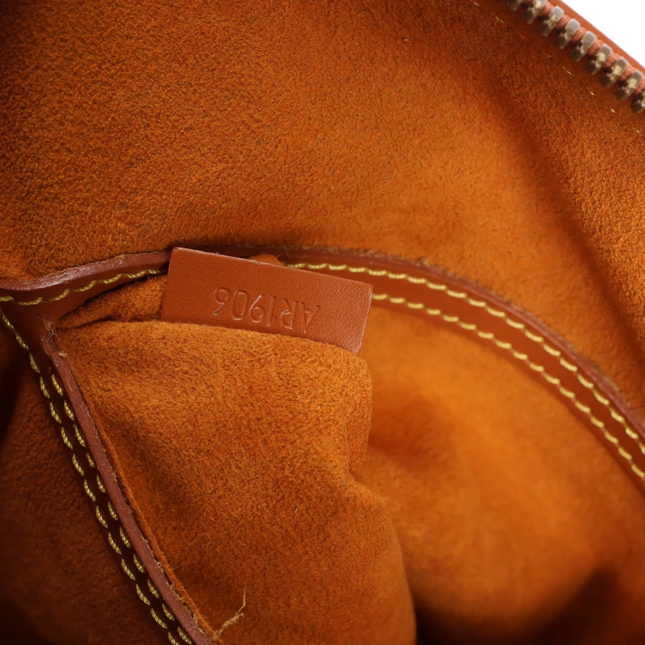 Louis Vuitton Alma PM Epi Leather Handbag in Brown