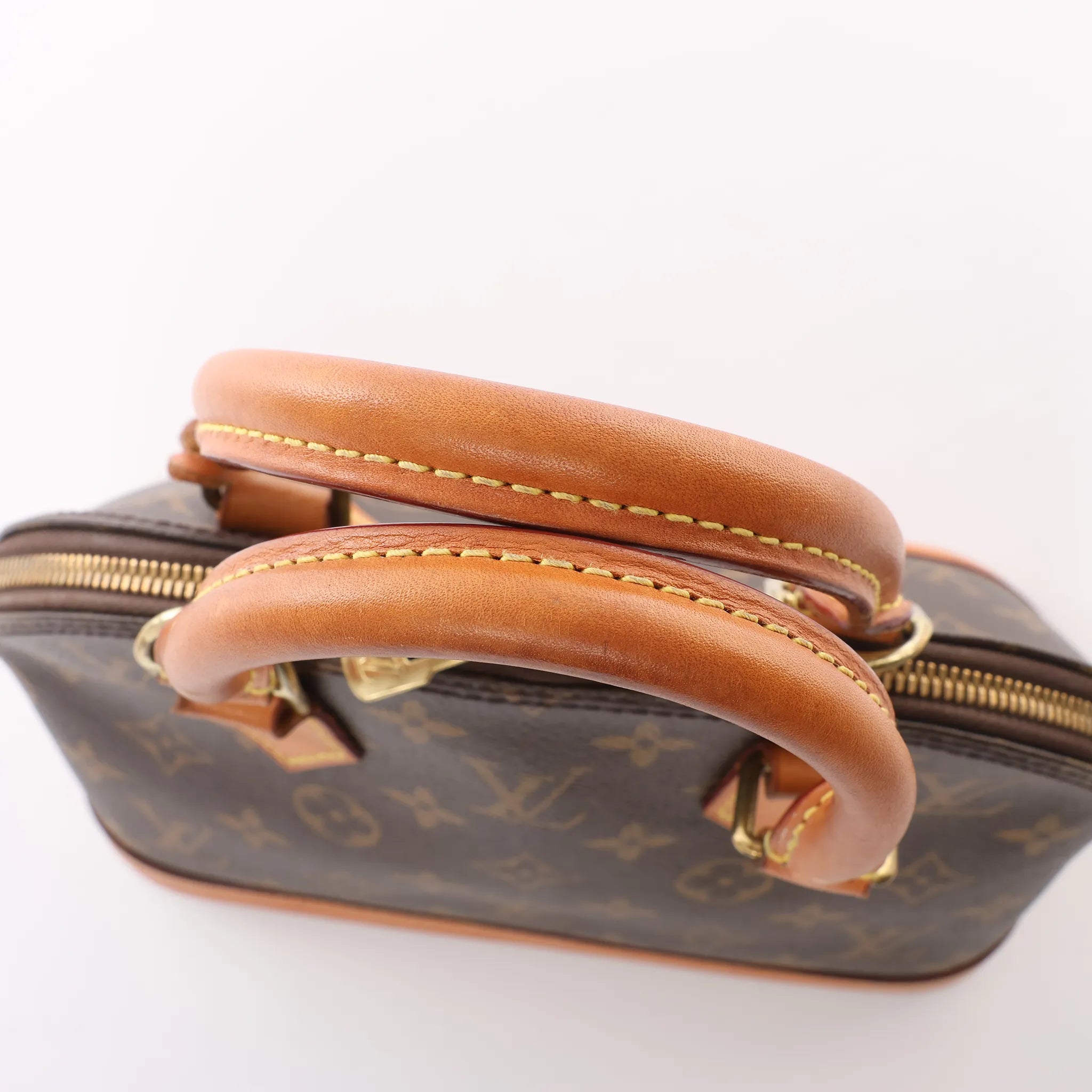 Louis Vuitton Alma BB Monogram Canvas 2Way Handbag in Brown M53152