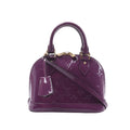Louis Vuitton Alma BB handbag in glossy purple Monogram Vernis with rolled top handles, a slim shoulder strap, luggage tag and gold-tone hardware.
