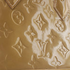 Louis Vuitton Alma BB Monogram Vernis 2Way Handbag in Gold M91677