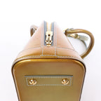 Bolso de mano Louis Vuitton Alma BB Monogram Vernis 2Way en dorado M91677
