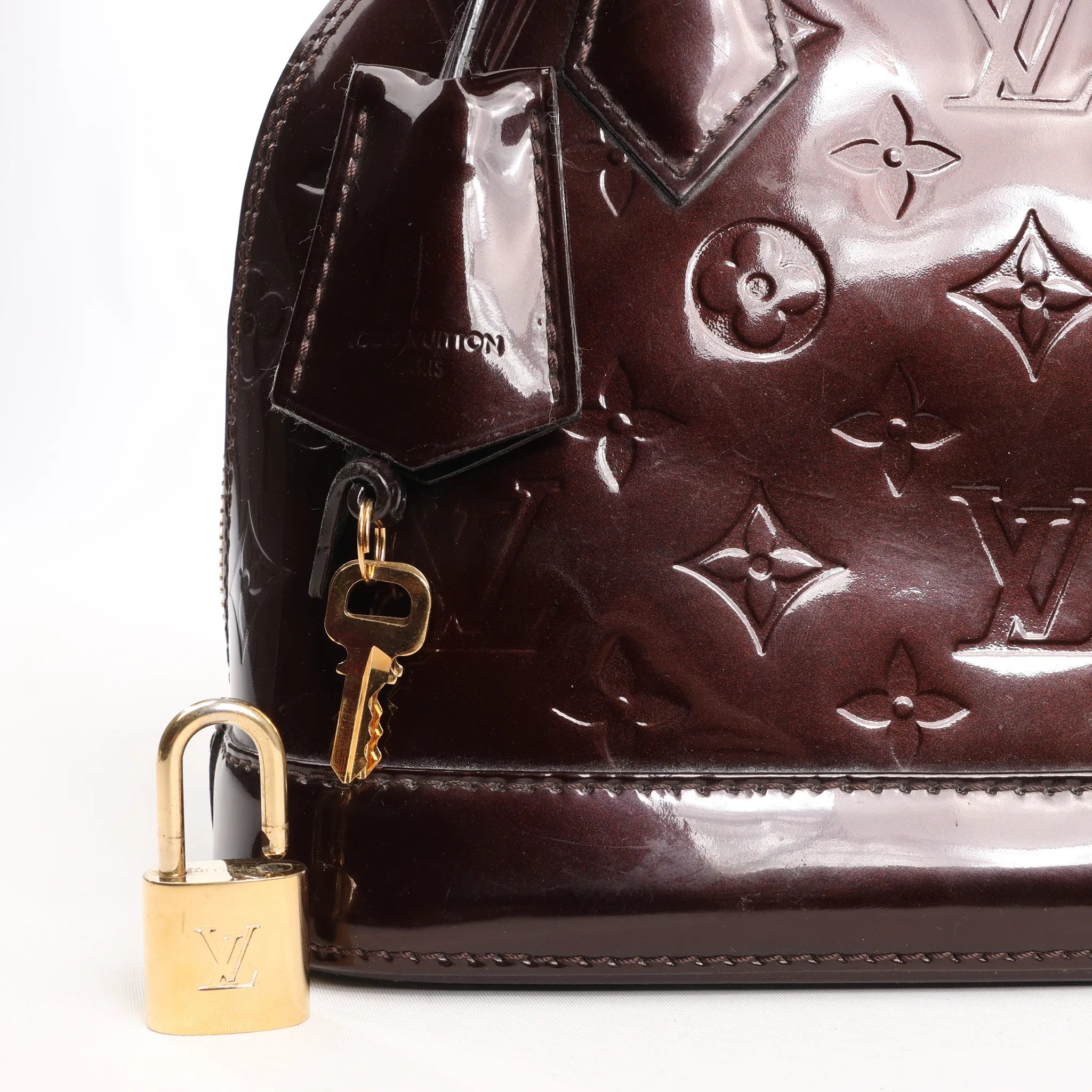 Louis Vuitton Alma BB Monogram Vernis Leather Handbag in Dark Purple M91678