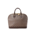 Louis Vuitton Alma PM Damier Ebene handbag in brown check canvas with dark leather trim, top handles, zip-top closure, and hanging padlock.