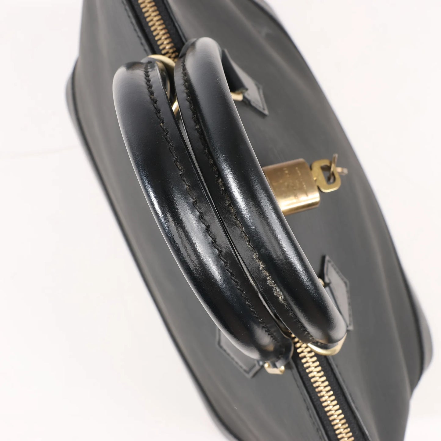 Louis Vuitton Epi Leather Alma PM Handbag in Black M52142