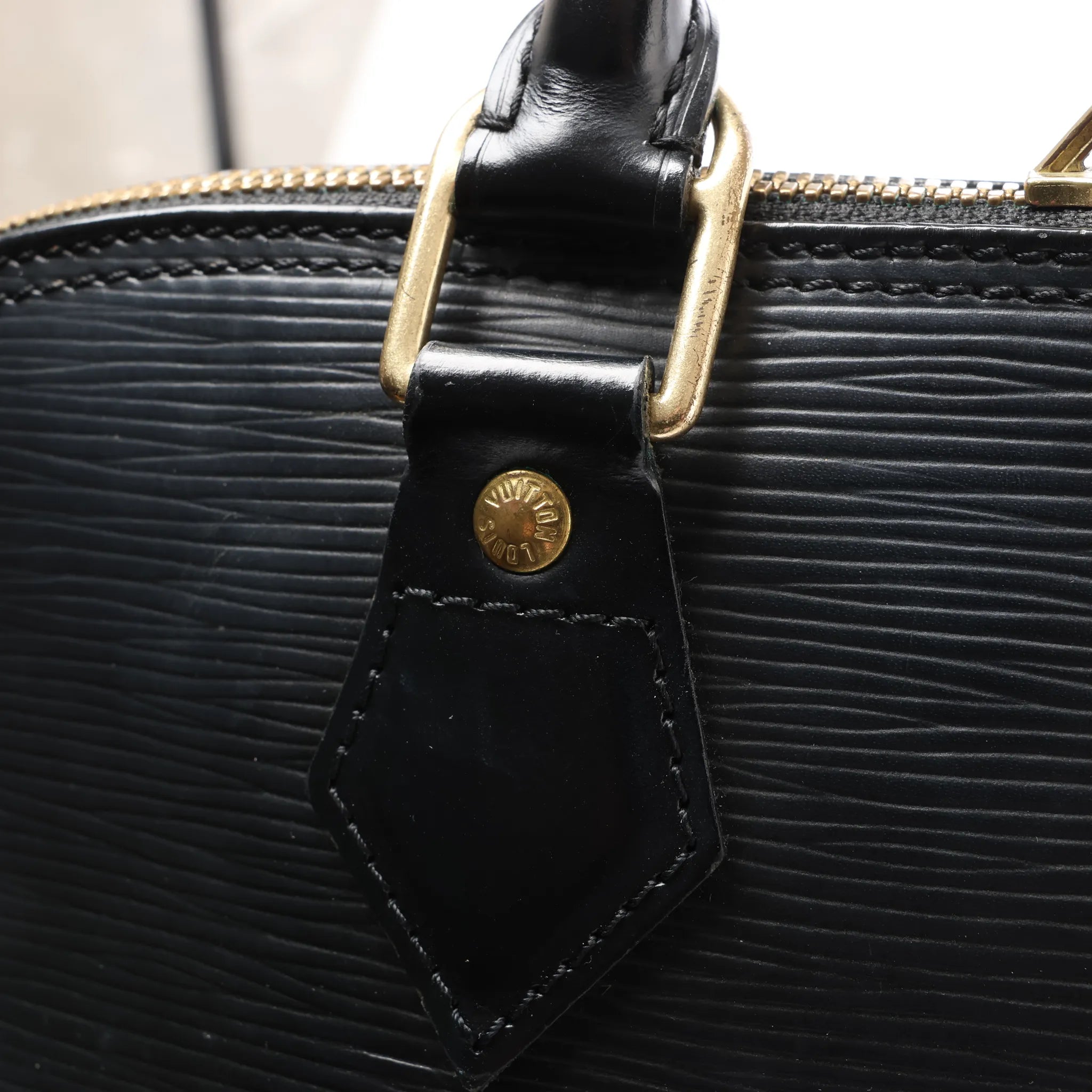 Louis Vuitton Alma PM Epi Leather Handbag in Black M52142