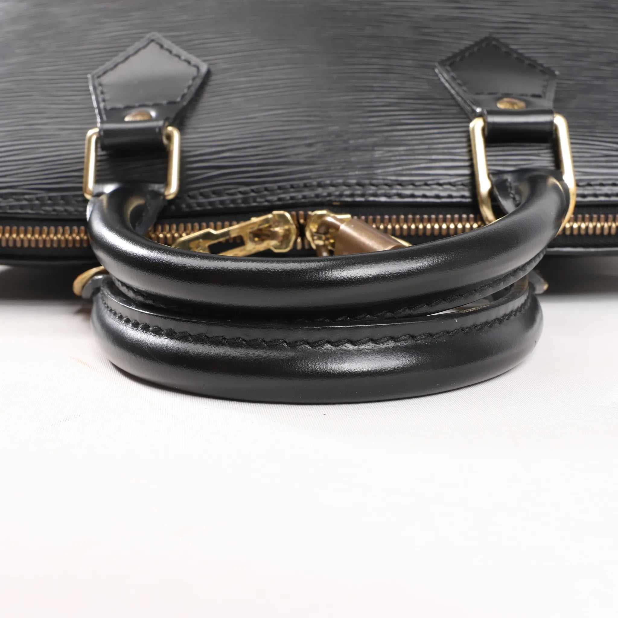 Louis Vuitton Epi Leather Alma PM Handbag in Black M52142