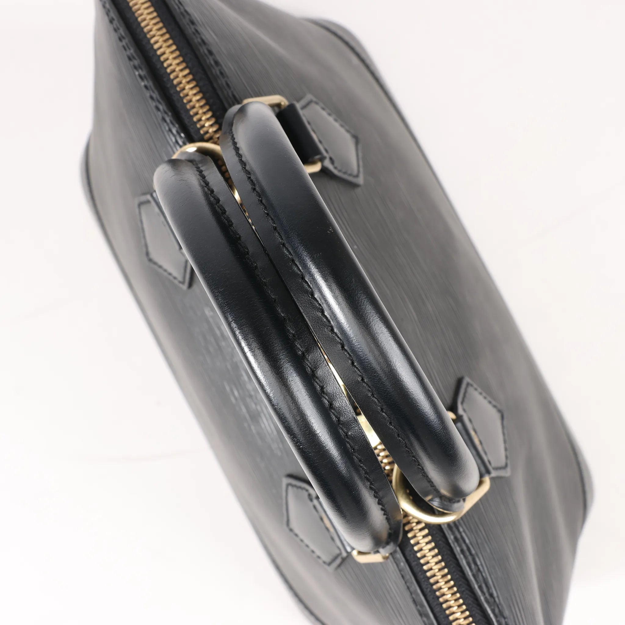 Louis Vuitton Epi Leather Alma PM Handbag in Black M52142