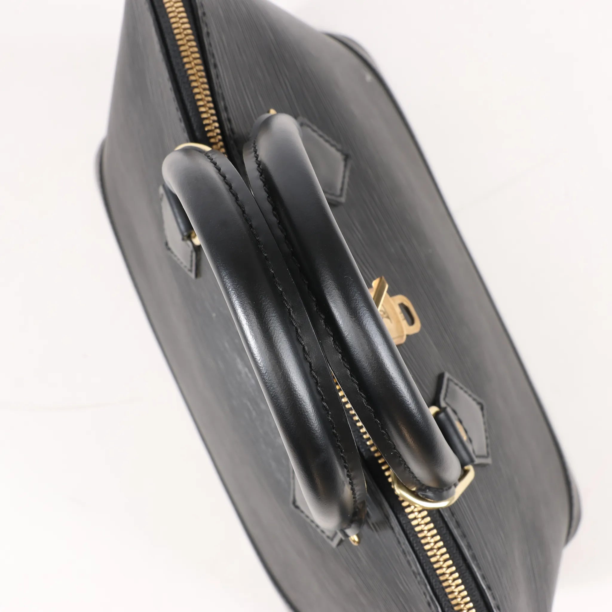 Louis Vuitton Epi Leather Alma PM Handbag in Black M52142
