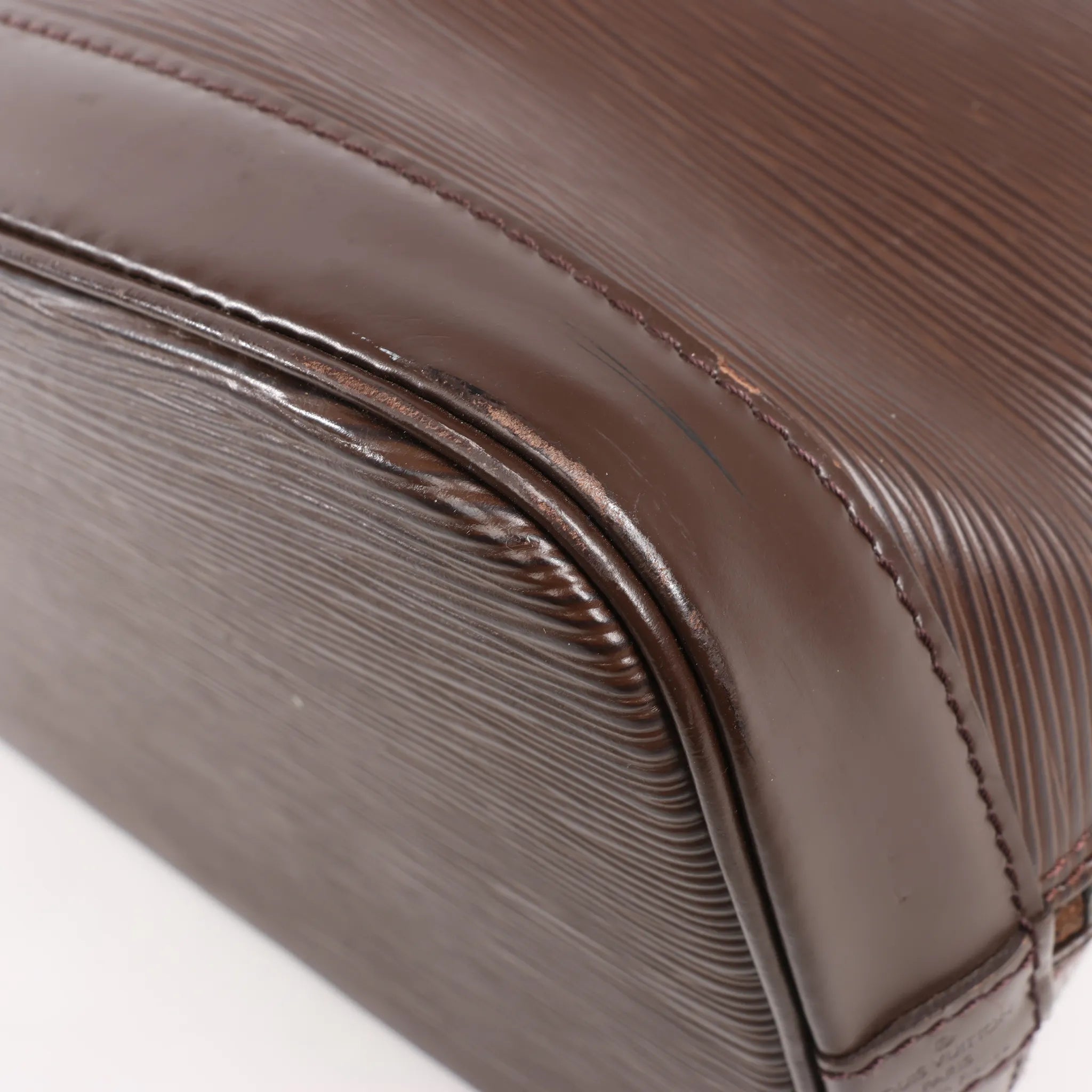 Louis Vuitton Alma PM Epi Leather Handbag in Brown M52143