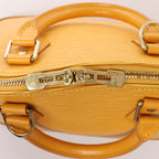 Louis Vuitton Alma Epi Leather Handbag in Yellow M52149