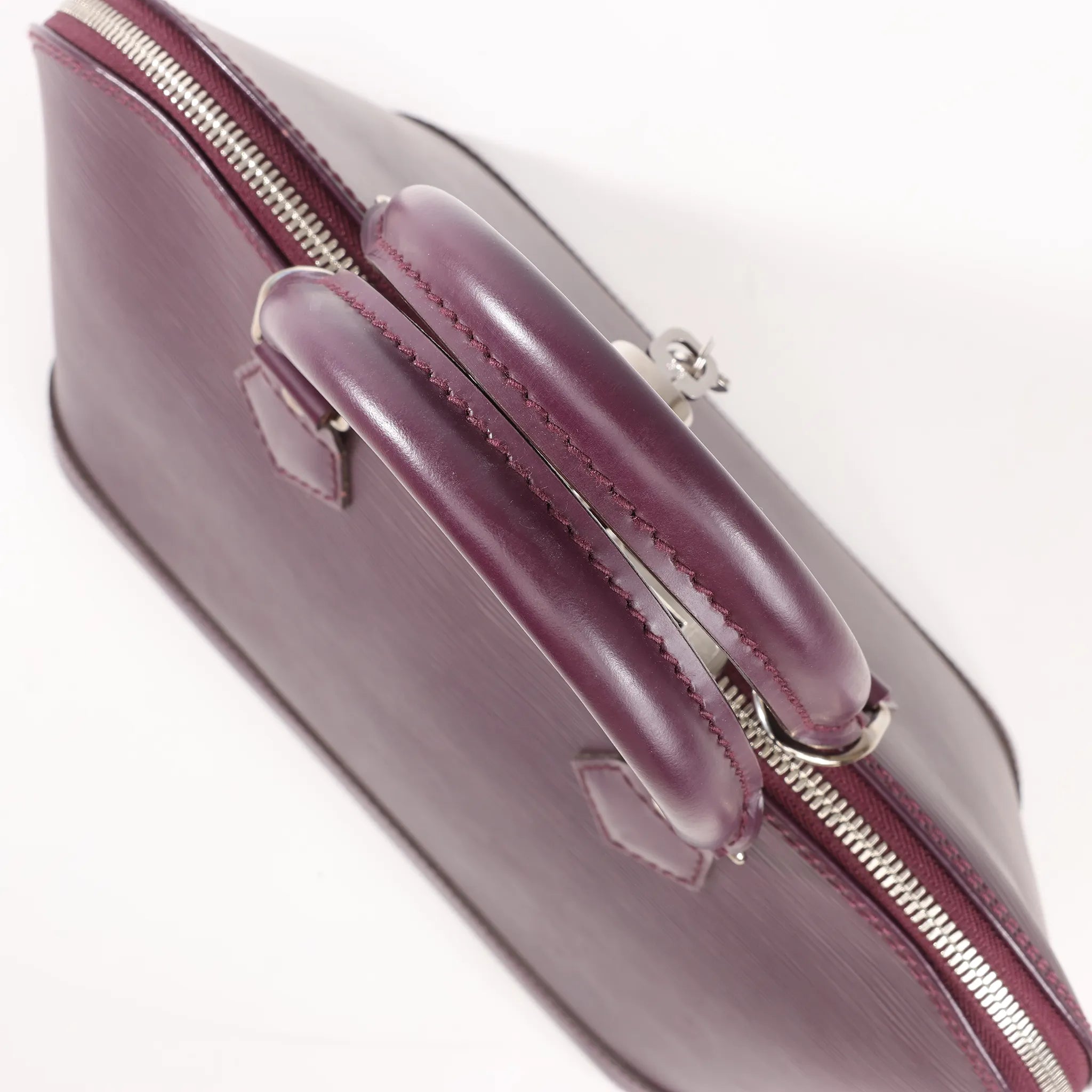 Louis Vuitton Alma Epi Leather Handbag in Purple M5280K