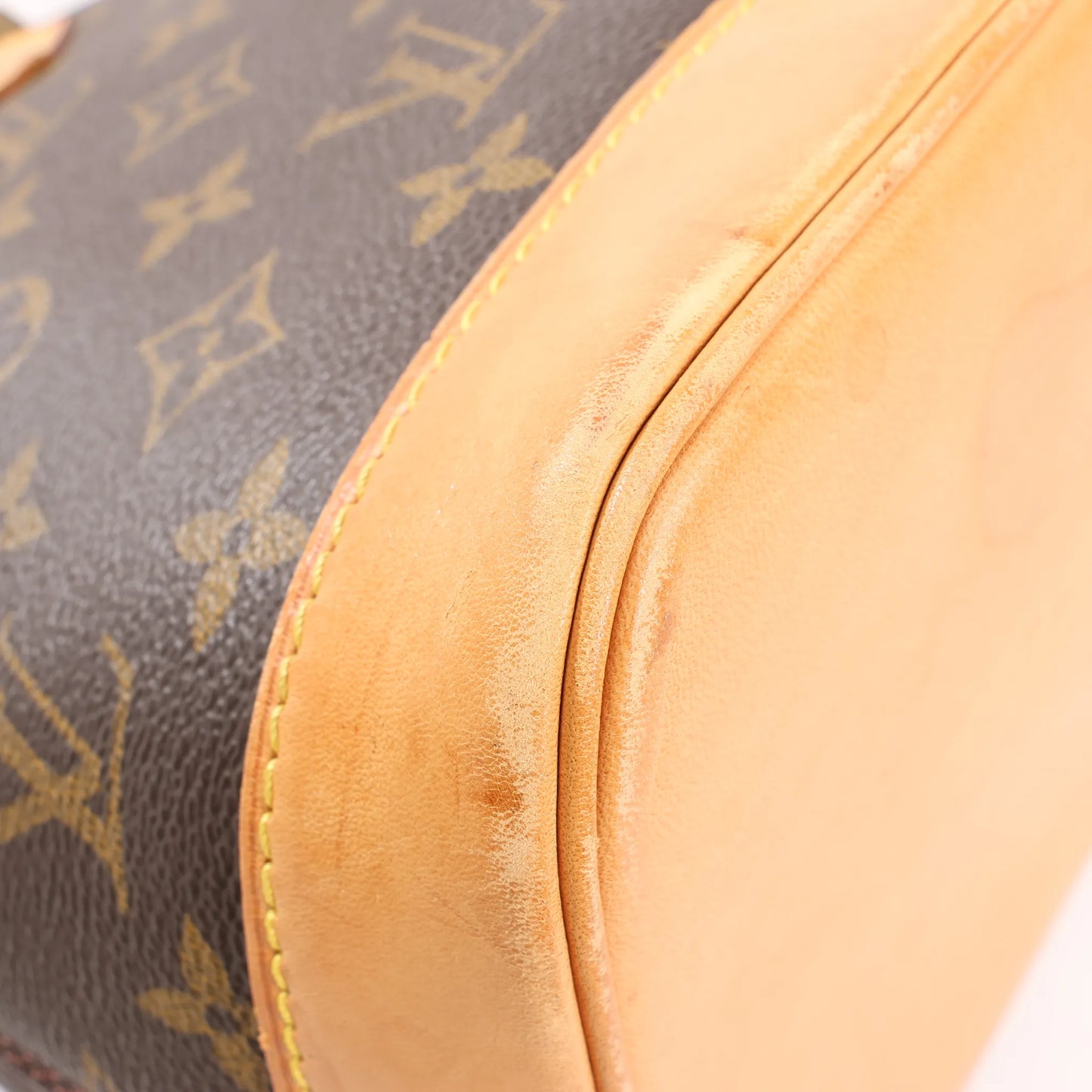 Louis Vuitton Monogram Canvas Alma PM Handbag in Brown M51130