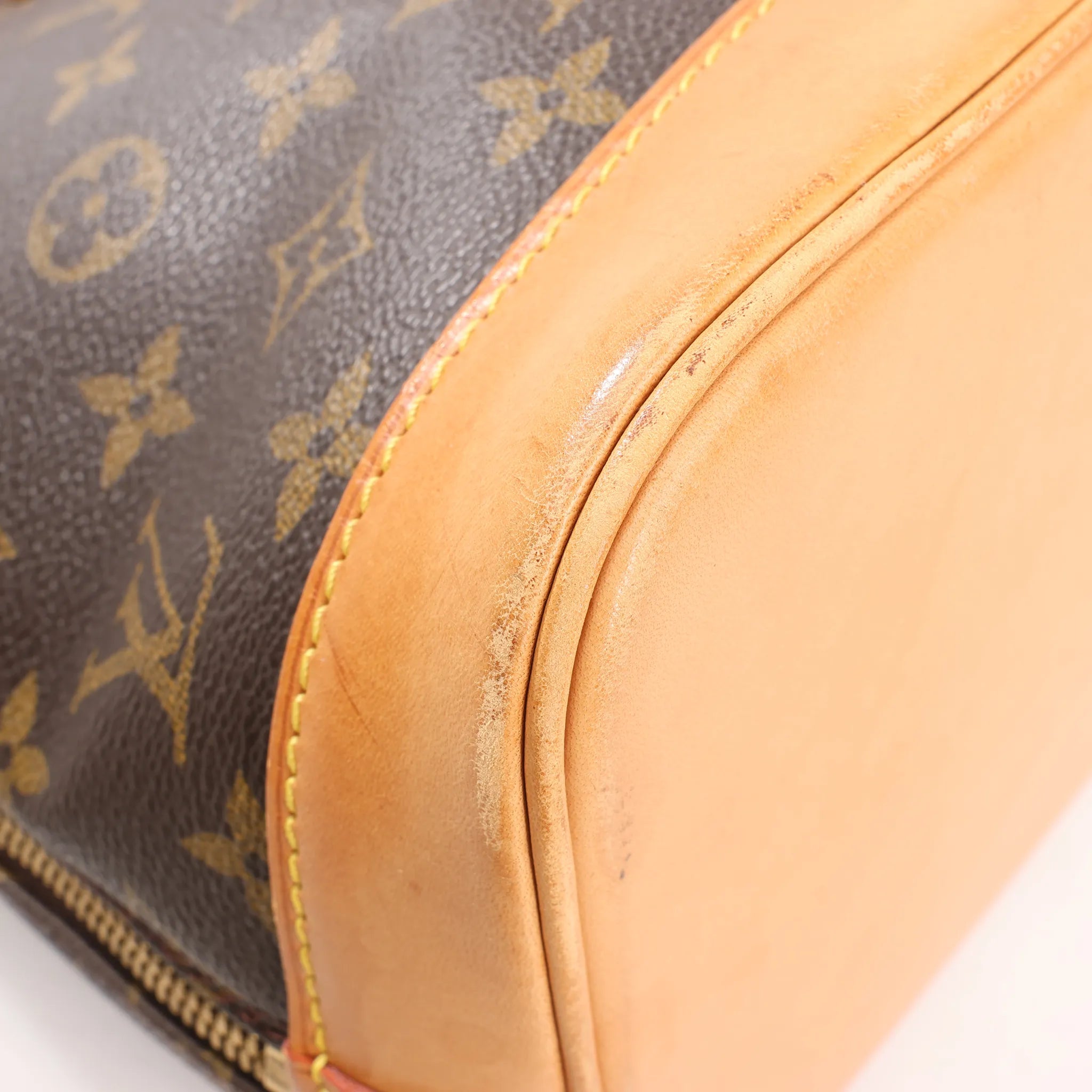 Louis Vuitton Monogram Canvas Alma PM Handbag in Brown M51130