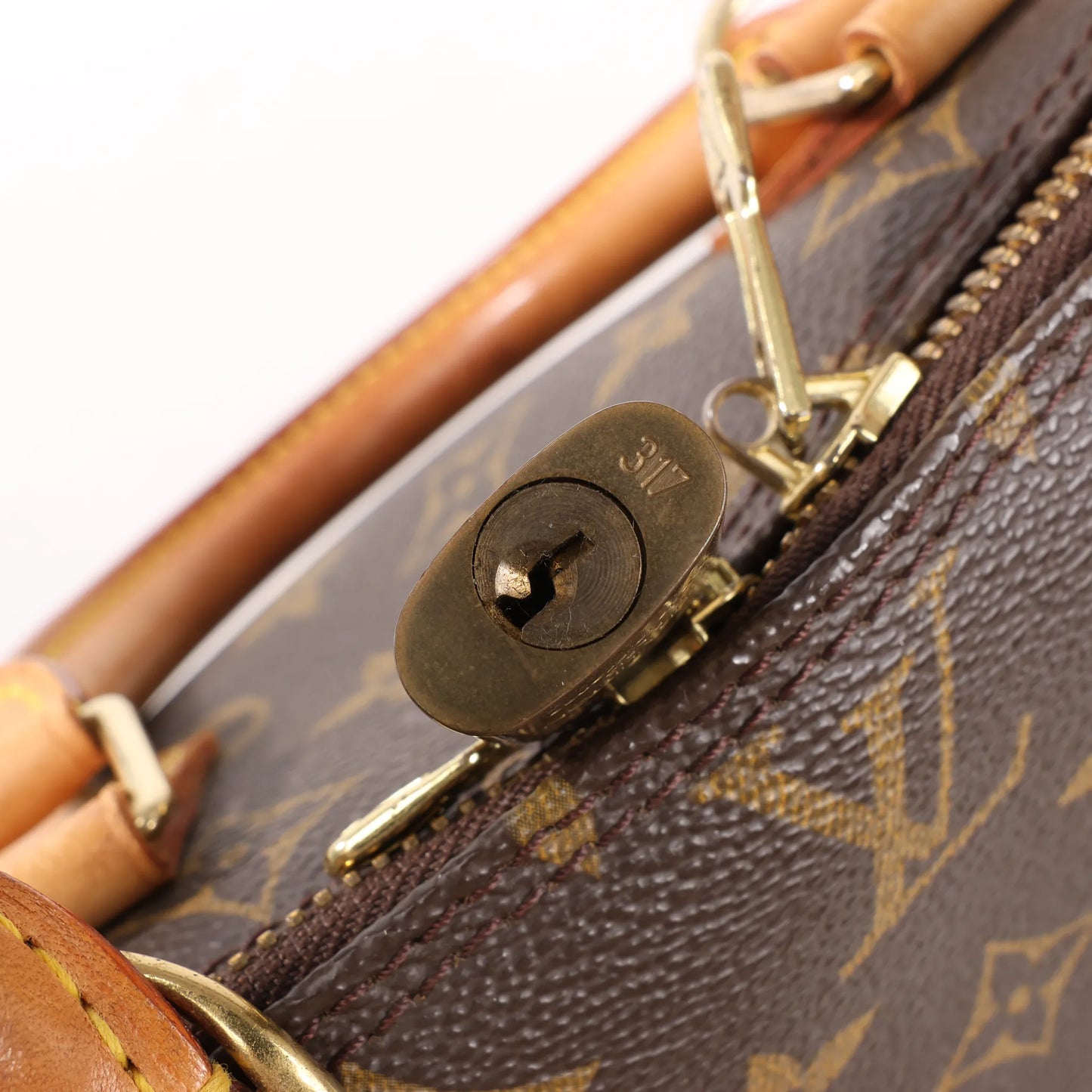 Louis Vuitton Monogram Canvas Alma PM Handbag in Brown M51130