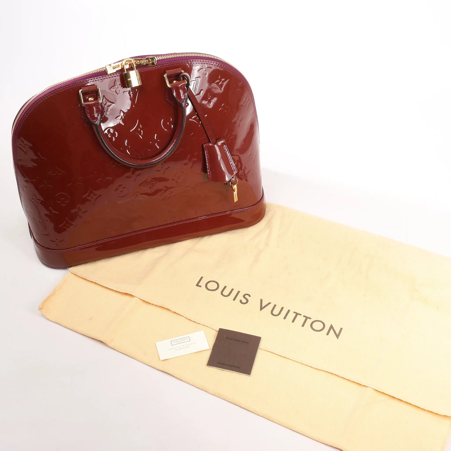 Louis Vuitton Alma GM Vernis Handbag in Burgundy M93594