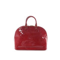 Louis Vuitton Alma GM handbag in glossy red Vernis patent leather with embossed Monogram, top handles, and gold-tone hardware on a white background.