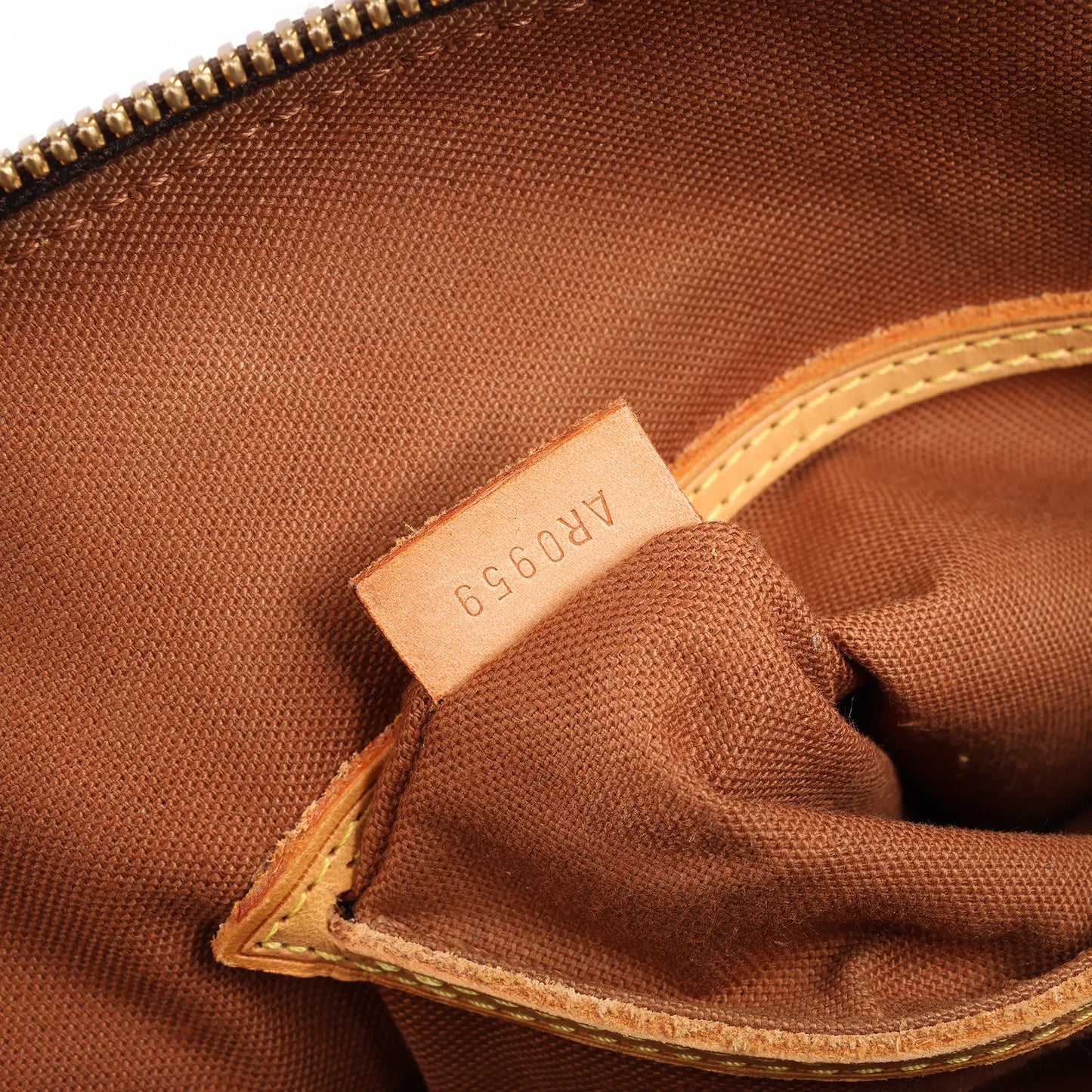 Louis Vuitton Monogram Canvas Alma PM Handbag in Brown M51130