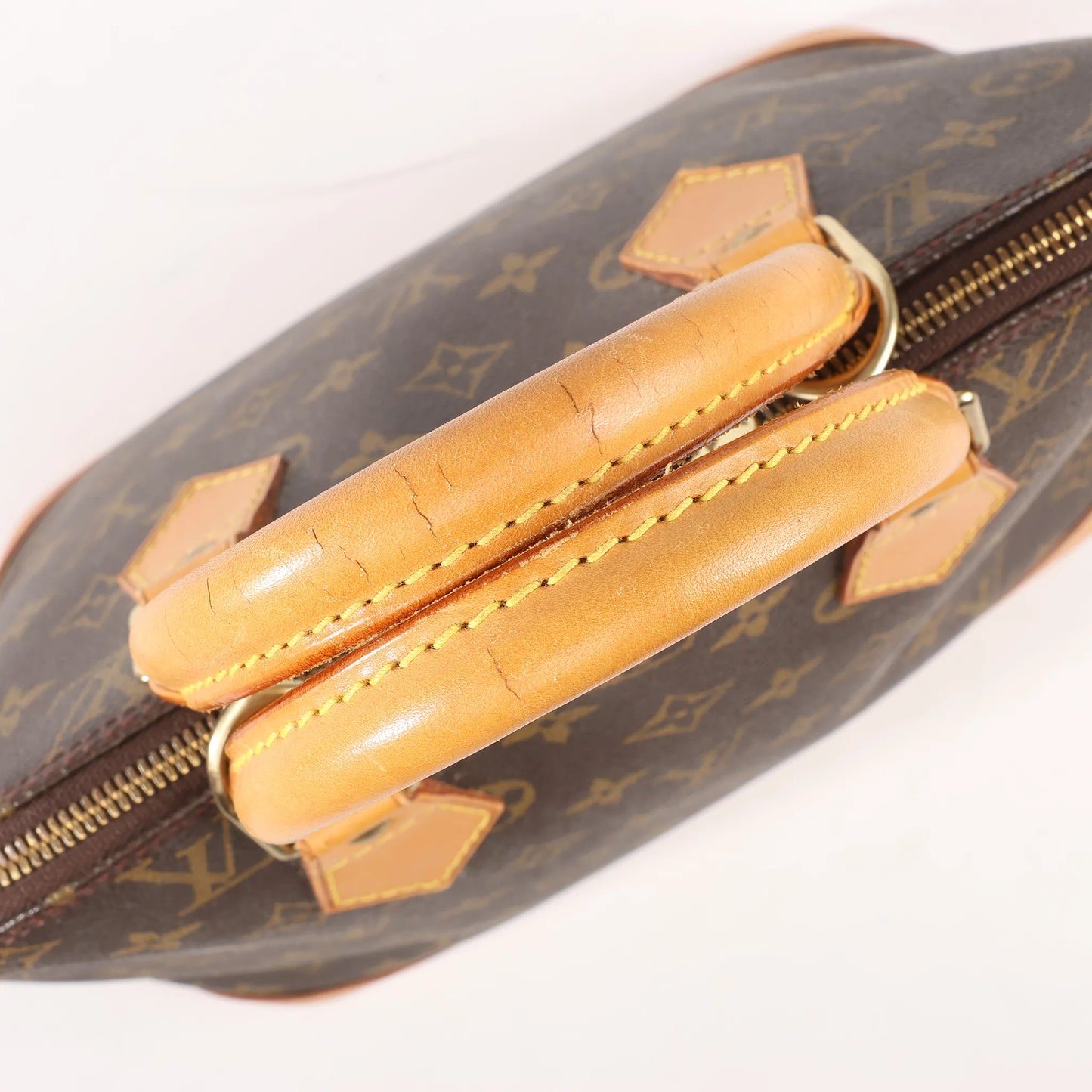 Louis Vuitton Monogram Canvas Alma PM Handbag in Brown M51130