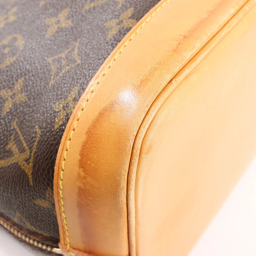 Louis Vuitton Monogram Canvas Alma PM Handbag in Brown M51130