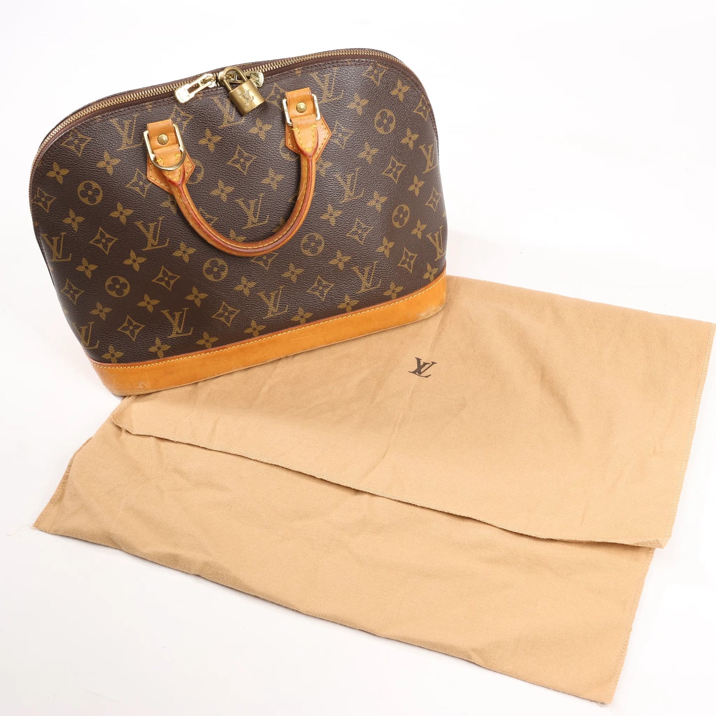Louis Vuitton Monogram Canvas Alma PM Handbag in Brown M51130