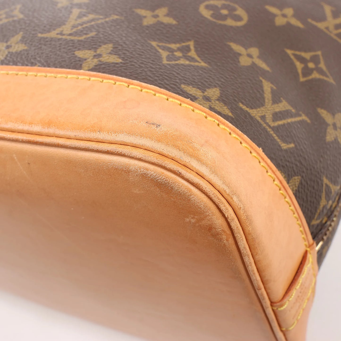 Louis Vuitton Monogram Canvas Alma PM Handbag in Brown M51130