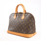Louis Vuitton Monogram Canvas Alma PM Handbag in Brown M51130