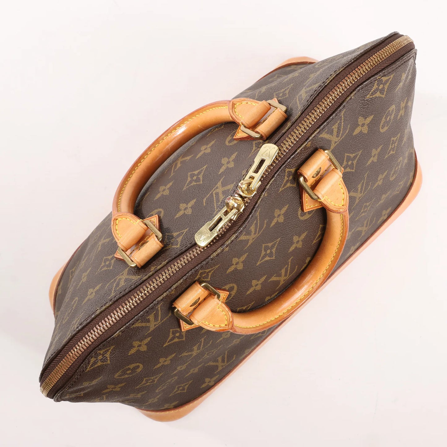 Louis Vuitton Monogram Canvas Alma PM Handbag in Brown M51130