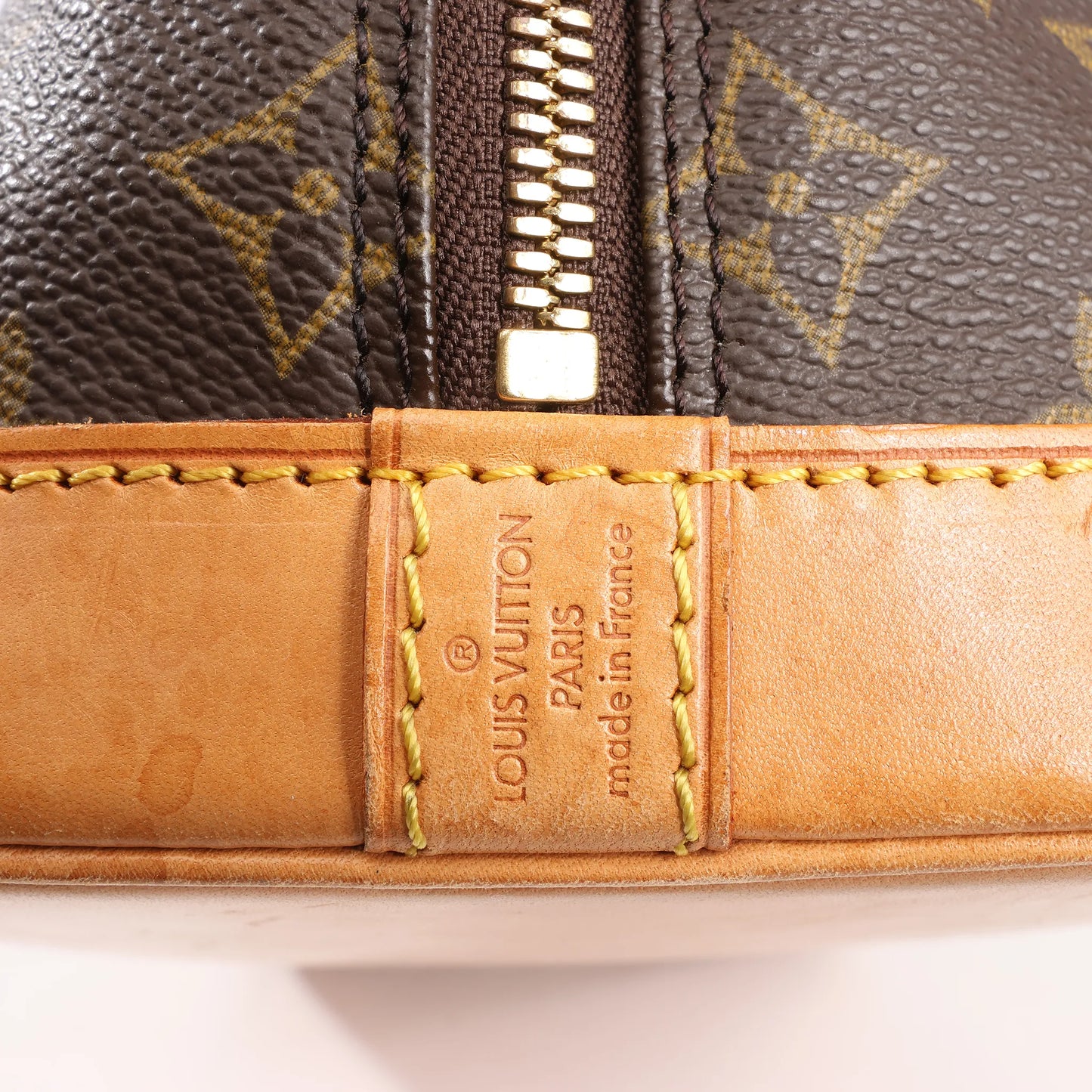 Louis Vuitton Monogram Canvas Alma PM Handbag in Brown M51130