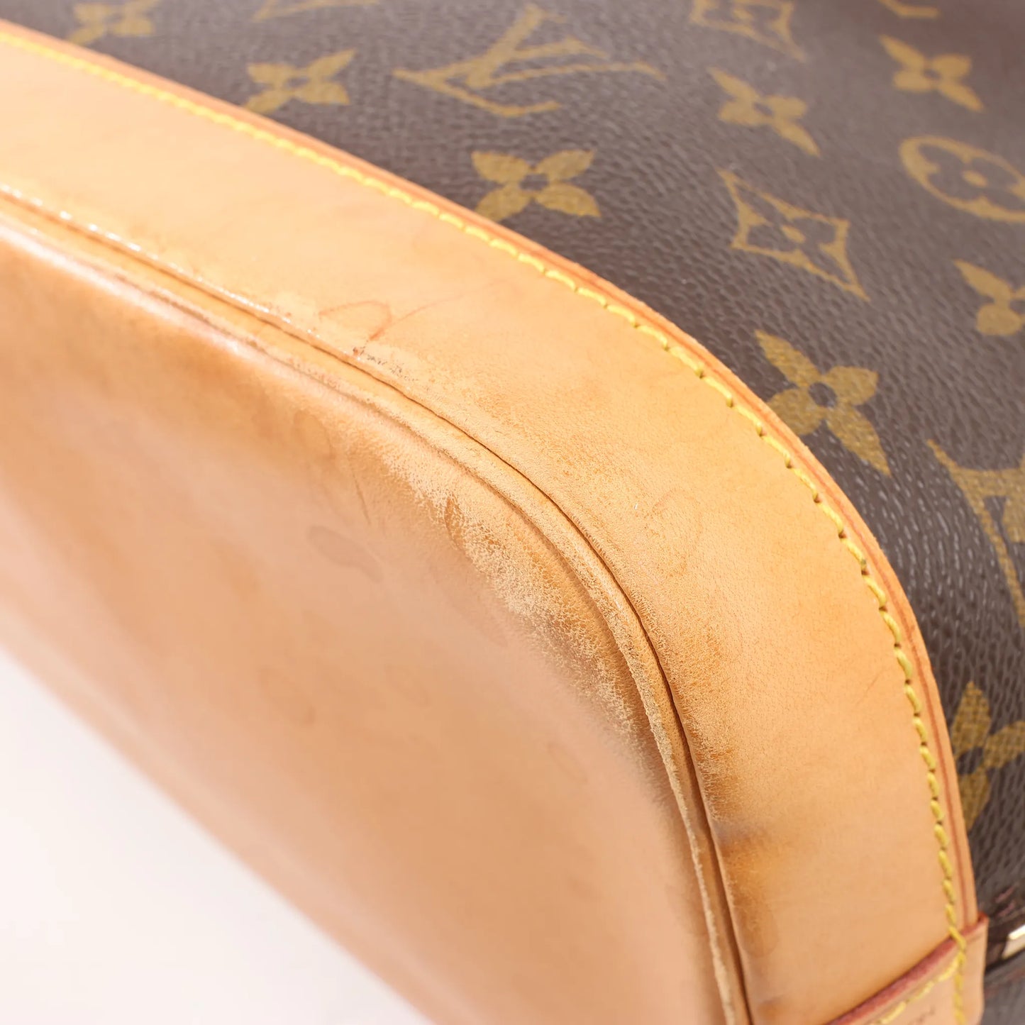 Louis Vuitton Monogram Canvas Alma PM Handbag in Brown M51130