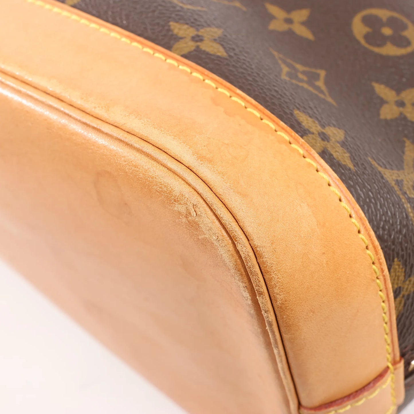 Louis Vuitton Monogram Canvas Alma PM Handbag in Brown M51130