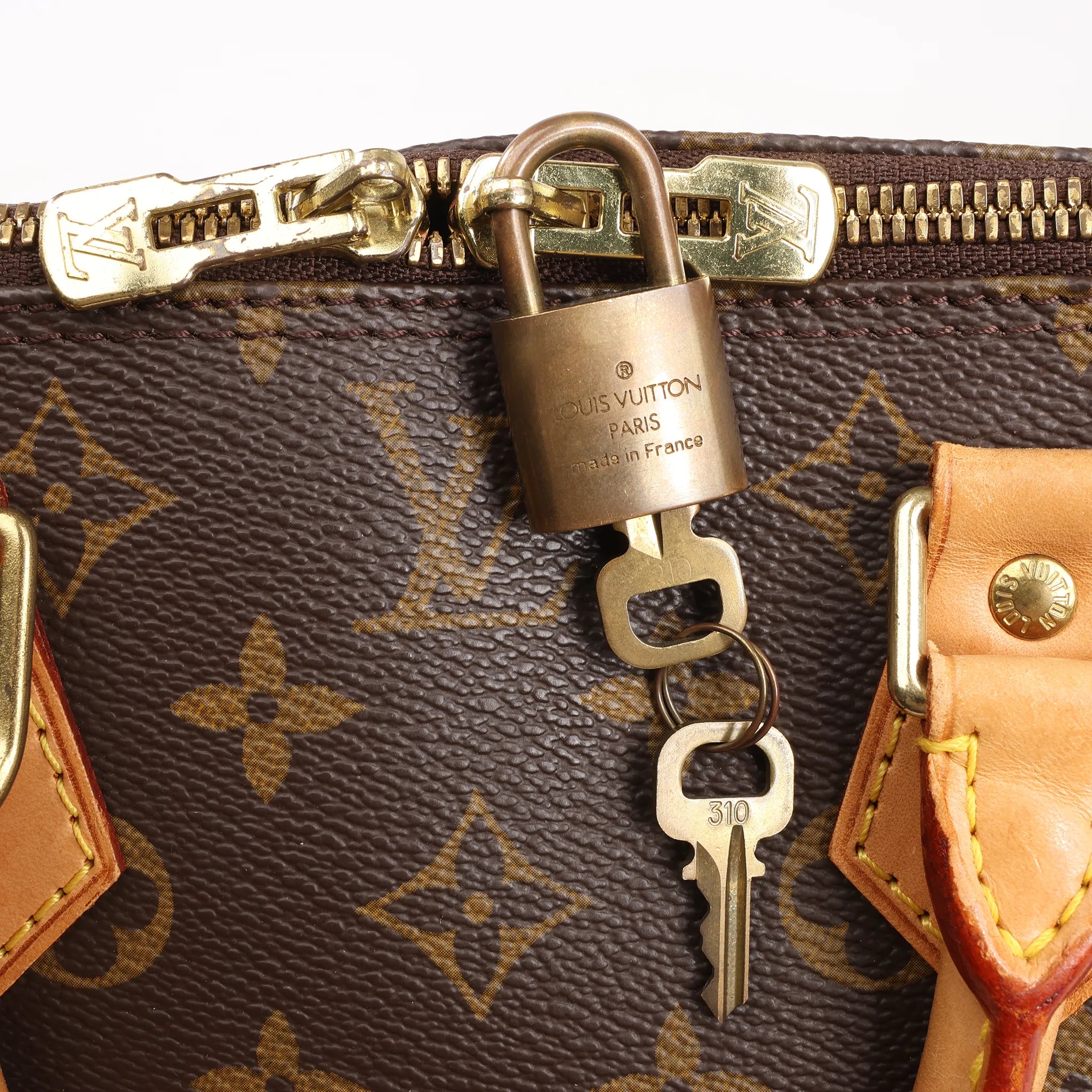 Louis Vuitton Monogram Canvas Alma PM Handbag in Brown M51130