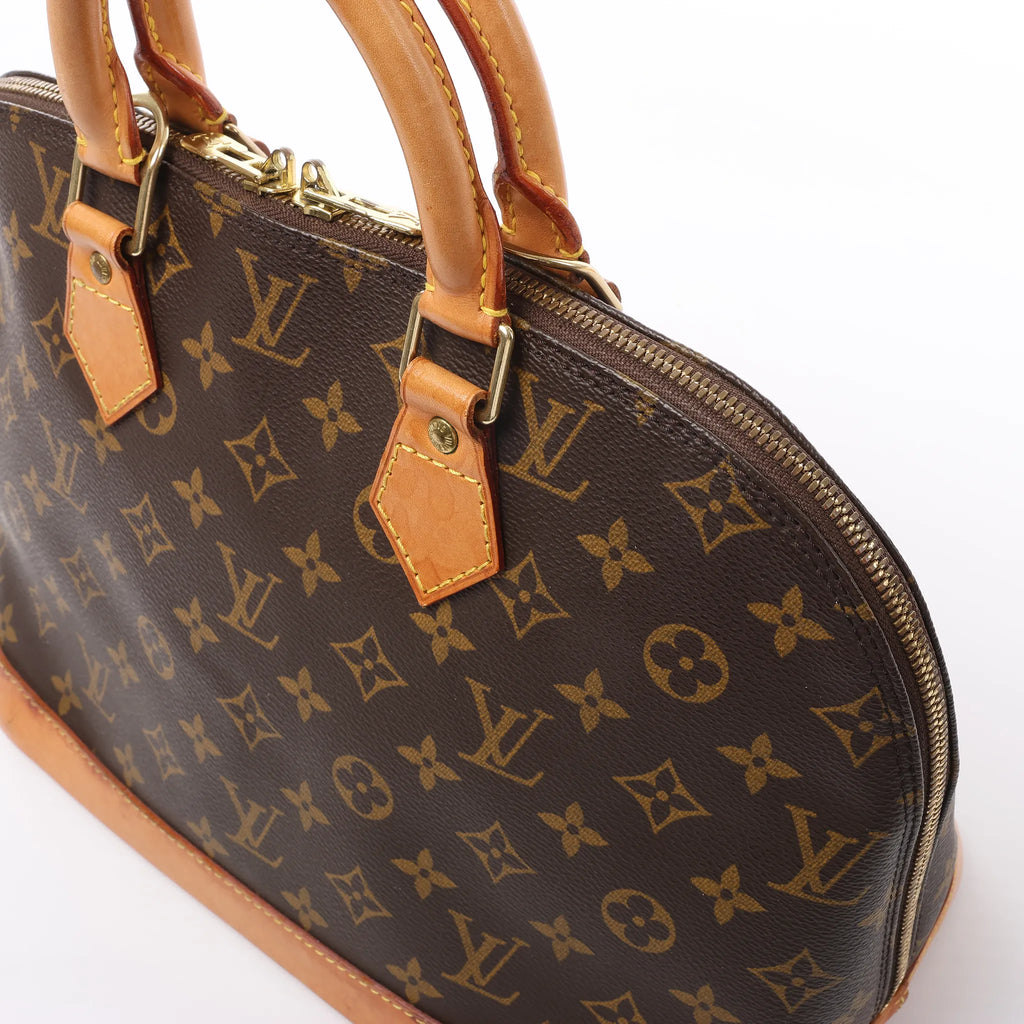 Louis Vuitton Alma PM Monogram Canvas Handbag in Brown M51130