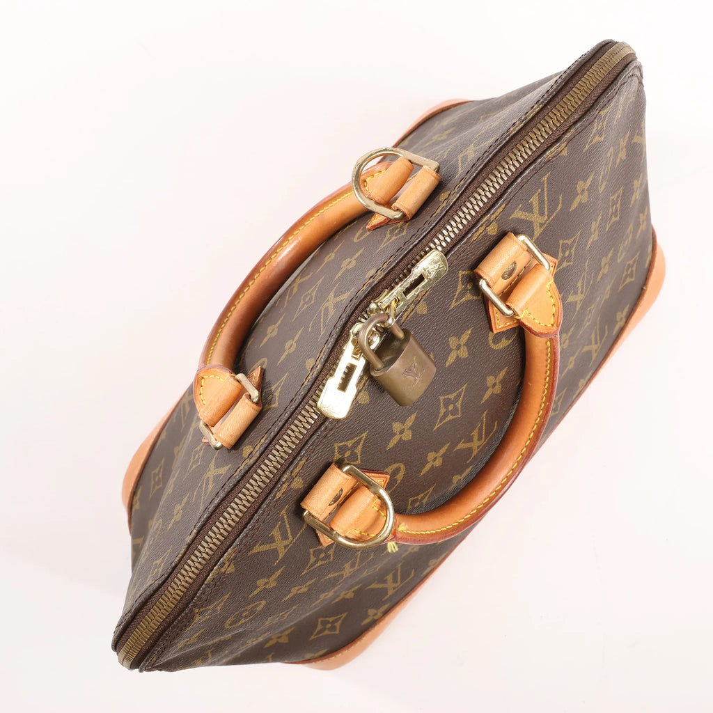 Louis Vuitton Monogram Canvas Alma PM Handbag in Brown M51130