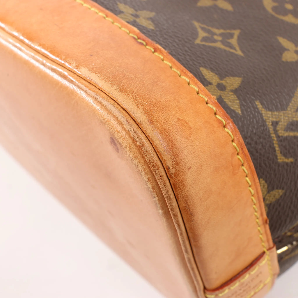 Louis Vuitton Monogram Canvas Alma PM Handbag in Brown M51130