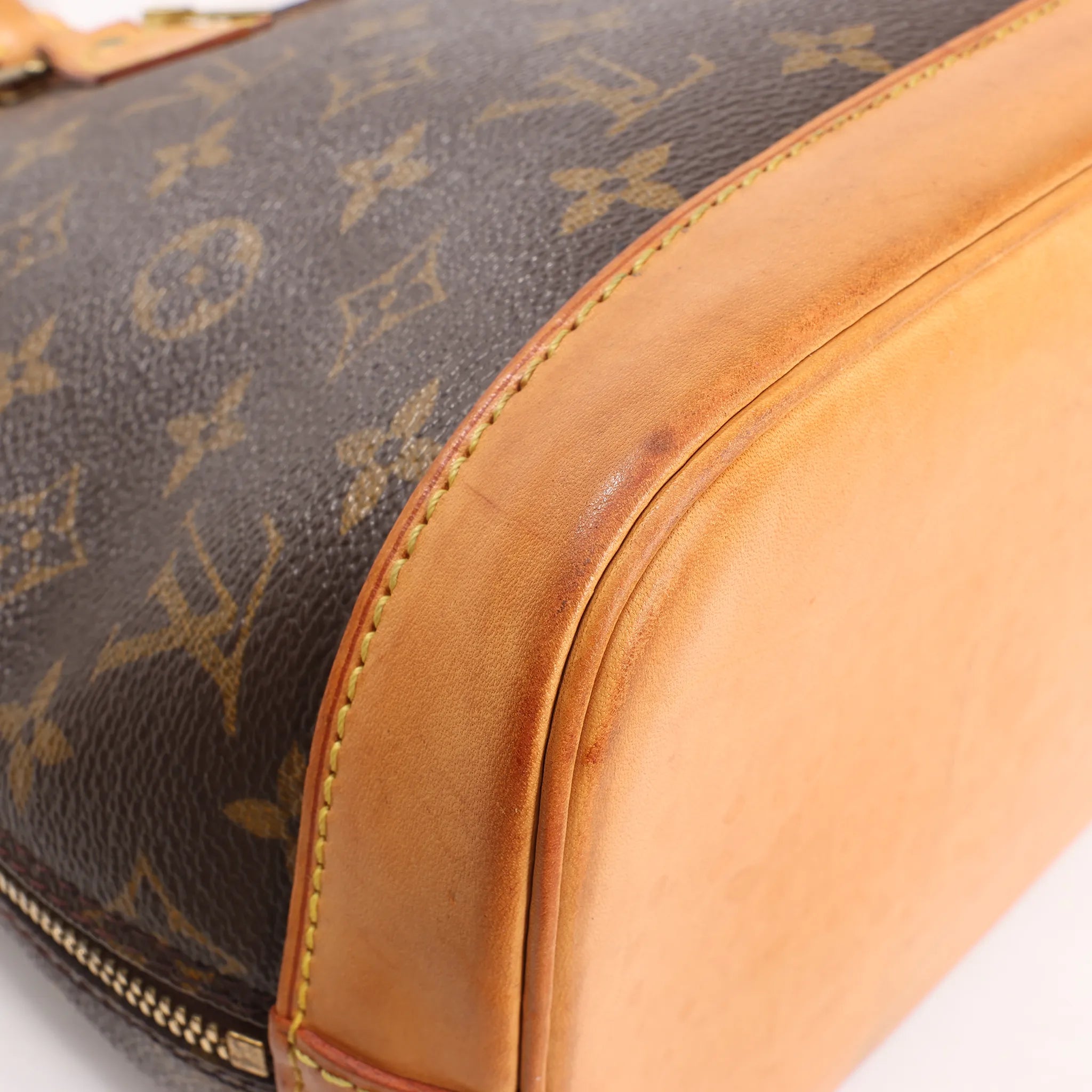Louis Vuitton Monogram Canvas Alma PM Handbag in Brown M51130
