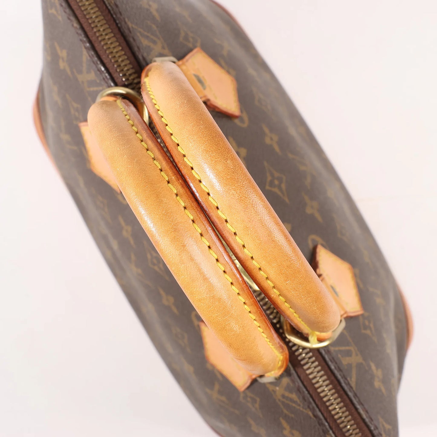 Louis Vuitton Monogram Canvas Alma PM Handbag in Brown M51130