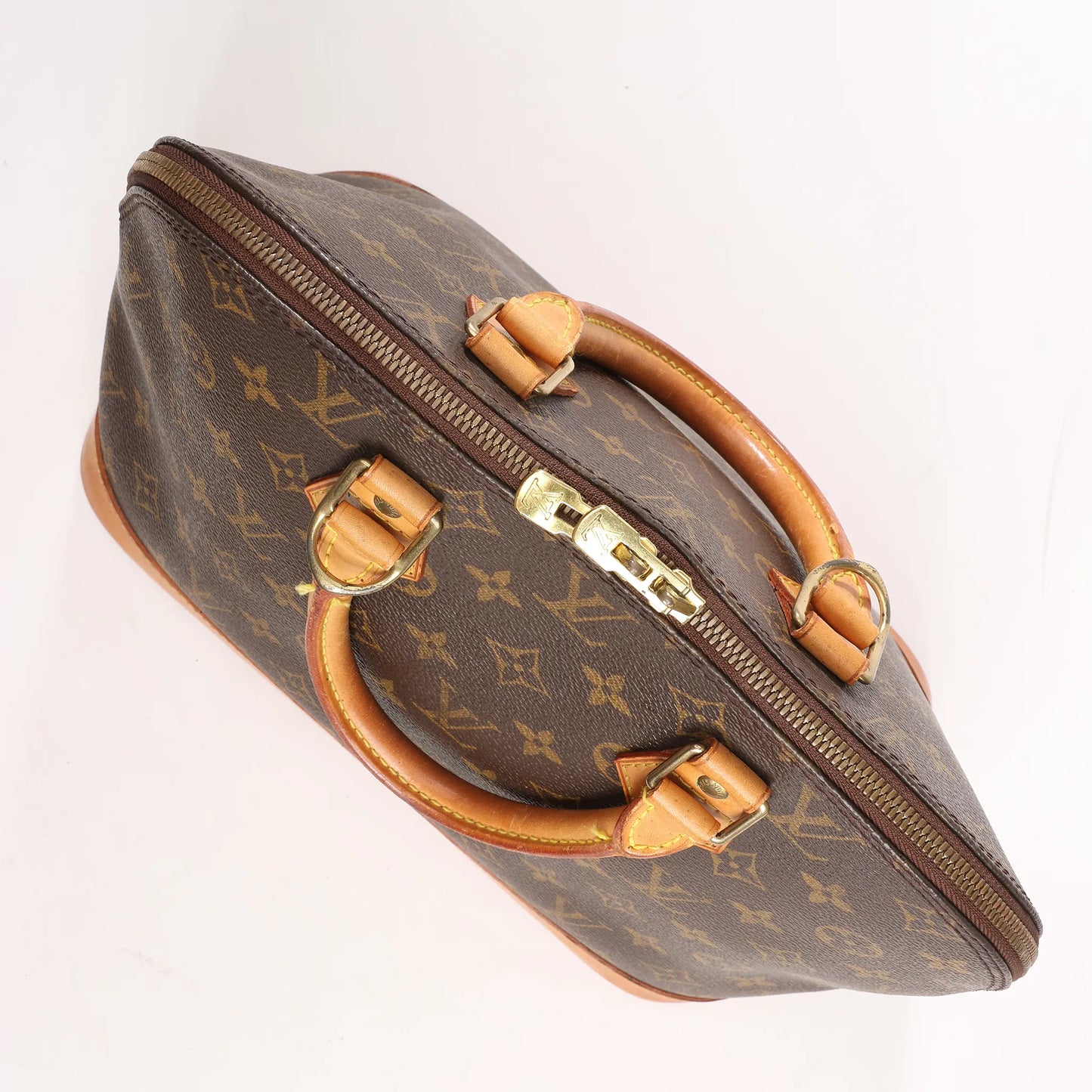 Louis Vuitton Monogram Canvas Alma PM Handbag in Brown M51130